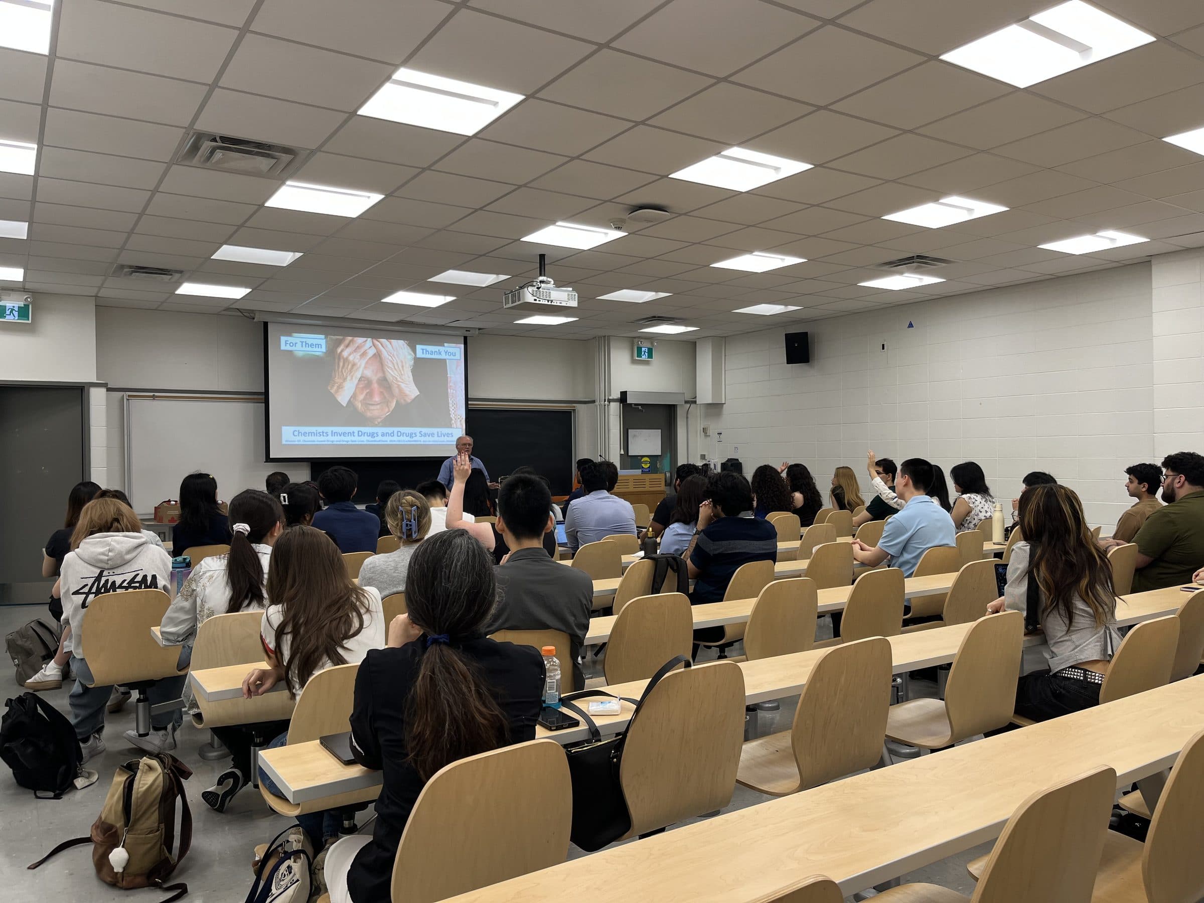 Students and a speaker at a MIND UofT event in a University of Toronto lecture hall